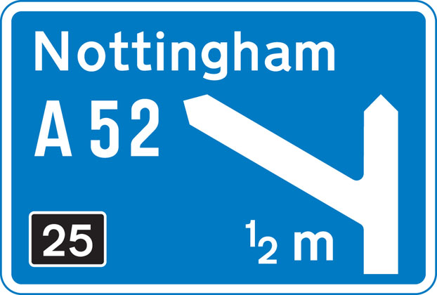 direction sign blue approach to junction