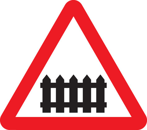 warning sign level crossing ahead barrier or gate