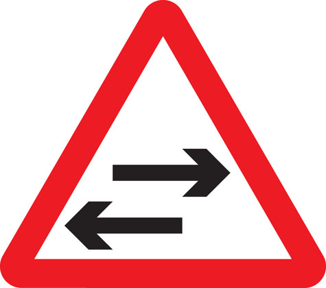 warning sign two way traffic crosses road