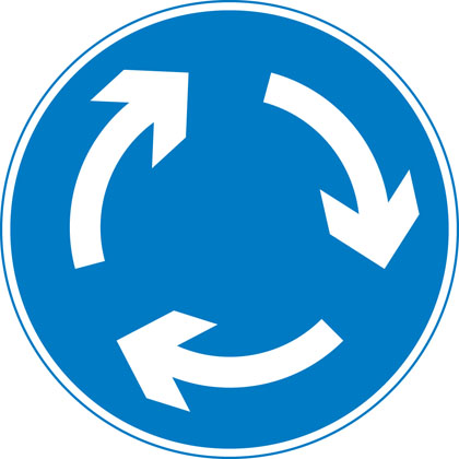 sign giving order mini roundabout