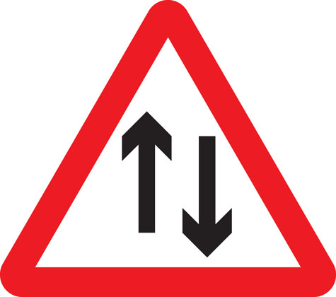 warning sign two way traffic ahead